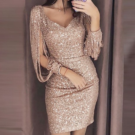 gold dress with tassels